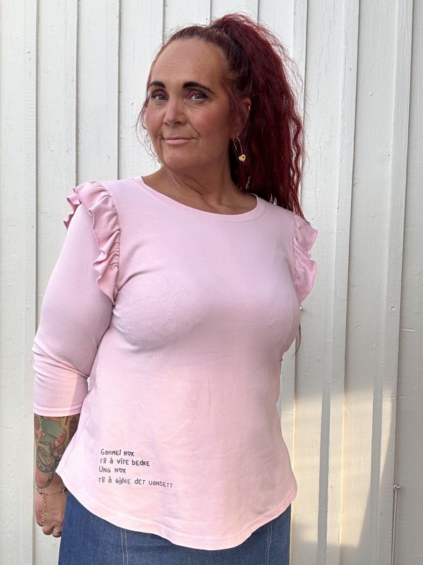 'Ung nok' jerseygenser med volanger_lyserosa